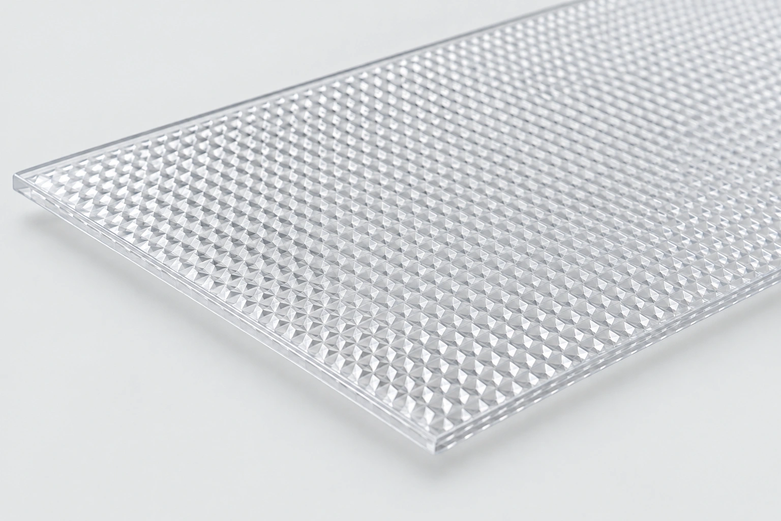 Illustrative prismatic plastic lighting diffuser panel